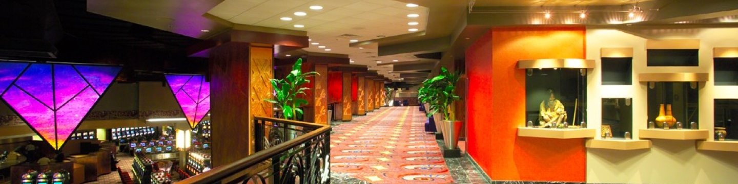 a balcony overlooking a casino game floor