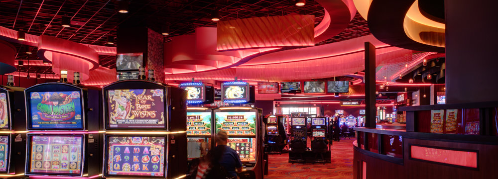 players play on a casino game floor