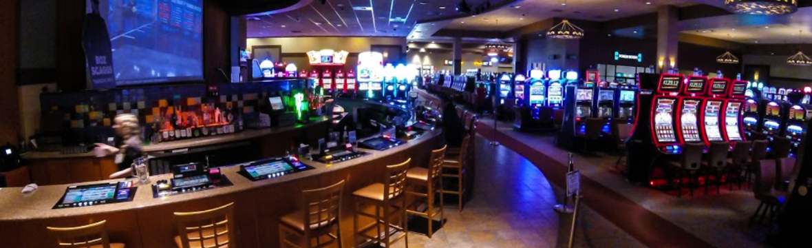 a casino game floor and bar area