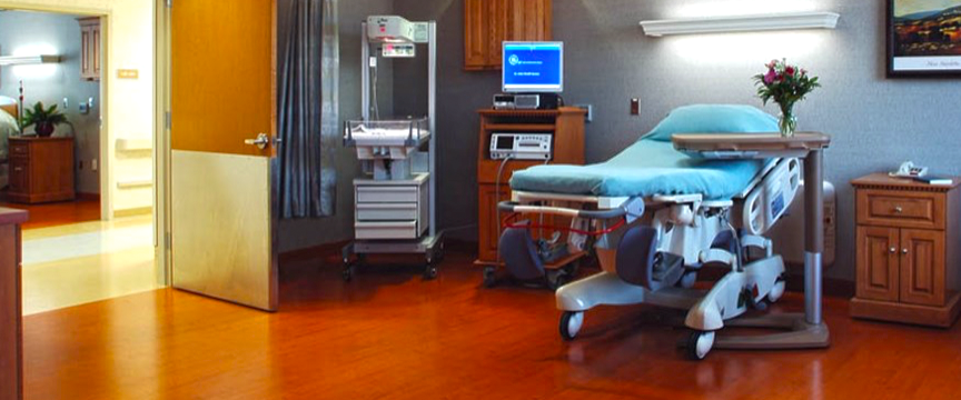 an empty patient's room in a medical building