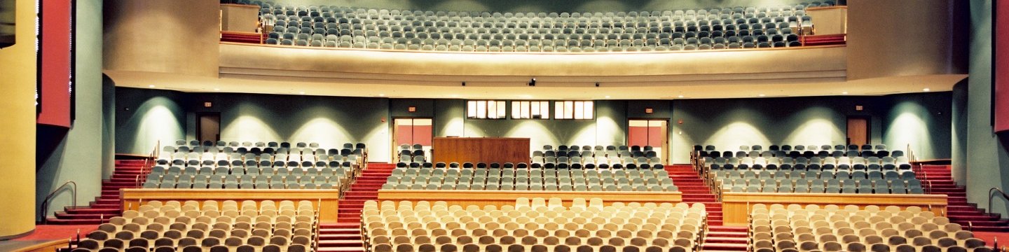 on the stage looking at the auditorium of a performing arts center