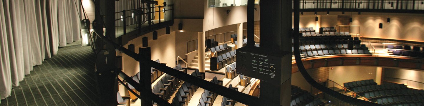 the rafters of a high school auditorium